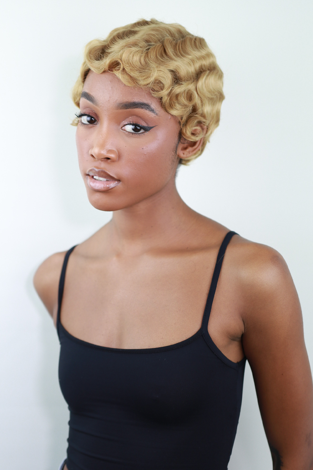Pana Blonde: Short Curly Heat Resistant Synthetic Fibre Wig