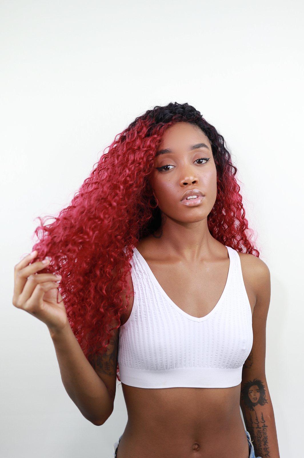 Fia Fia: 26-Inch Curly Heat Resistant Synthetic Fibre Red Wig
