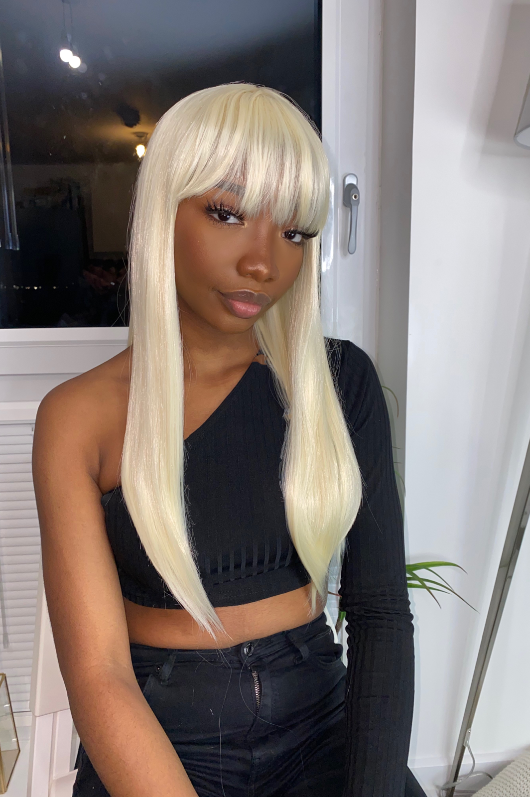 Iskaba Platinum Blonde: 22-Inch Long Heat Resistant Synthetic Wig with Bangs
